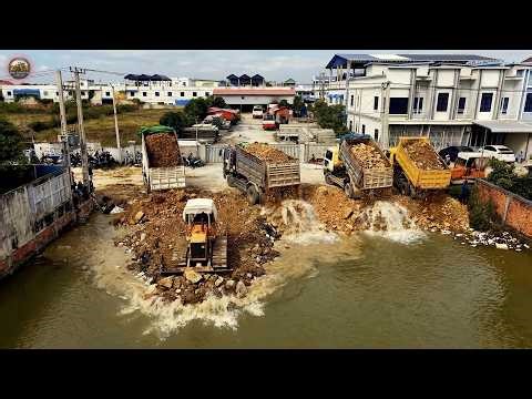 Awesome Start! Komatsu D31P Dozer & 5 Ton Dump Truck Begin New Landfill Project.