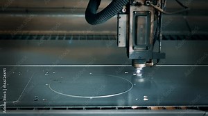 Laser cut machine while cutting the sheet metal with sparks and high precision