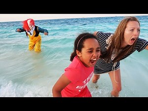 CREEPY CLOWN ON THE BEACH!! - Videos For Kids