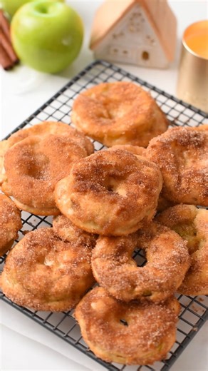 Carine Claudepierre on Instagram: "Comment ' RECIPE' and I'll DM you the recipe for these Apple Rings, which are chewy, oven-baked apple slices covered with a delicious chewy dough and coated with crunchy cinnamon sugar. . https://www.theconsciousplantkitchen.com/apple-rings/ . #appleseason #appledesserts #applerecipe #fallbaking #applerings"