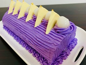 Ube macapuno Cake Roll is made of a soft ube flavored chiffon cake rolled and filled with ube butter cream and macapuno strings . One of the most popular cake in the Philippines. Ube macapuno roll cake Recipe For the sponge Eggs 3pcs ( large) Cake flour 90g (3/4 cup) Vegetable oil 30ml( 2tbsp) White sugar 90g (1/2cup) Baking powder 1/2 tsp Salt 1/4tsp Water 30ml ( 2tbsp) Ube flavour 1/4 tsp Icing Butter 240ml ( 1 cup) 70g icing sugar (2/3 cup) Condensed milk 1/2cup Ube flavor 1/4 tsp ( variable)