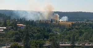 Firefighters battle small brush fire in Spokane north of Maple Street Bridge