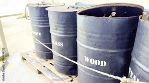 Ship’s garbage station with color-coded waste bins for segregation under MARPOL environmental regulations.