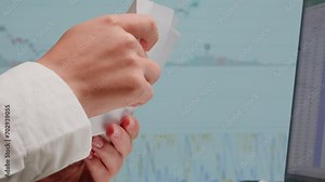 Close-up of financial cash flow data on PC screen. Counting invoices close-up. Mortgage chart