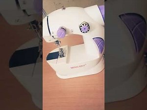 How to do threading in mini sewing machine