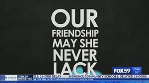 Angela Ganote sings Purdue's fight song