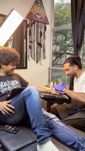 Imprints Tattoo Studio on Instagram: "Where music burns into flesh. Treble & bass clef entwined with thorns, on fire and melting into the hand of @mushroom.headed.guy Art by @imprints_nave Bookings open | DM for free consultation #tattooimprinted #tattoo #bangalore #inked #music"