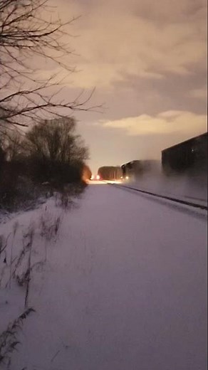 Pre dawn CSX freight flies through the snow towards the glow of Erie! 11626 #locomotive #railway