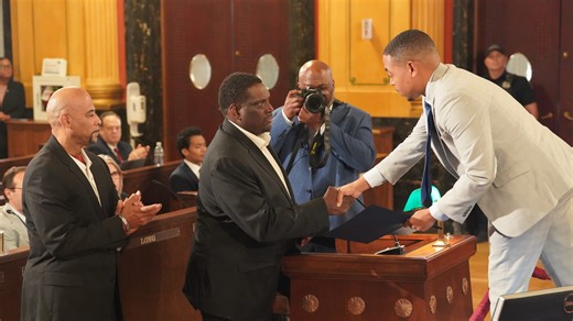 Columbus East HS coach Mike Bell honored for saving wounded player's life