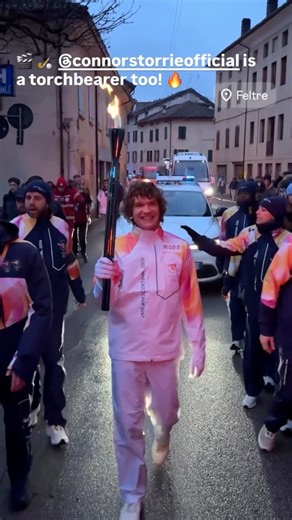 “Heated Rivalry” stars Hudson Williams and Connor Storrie are HEATING UP the #MilanoCortina2026 Olympic torch relay in Italy! 🔥 (🎥: milanocortina2026) #Olympics | Extra