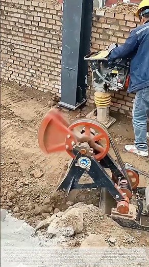 Pounding the Earth: How a Mechanical Frog Leaps to Compact the Ground