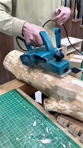 Smoothing a Large Rustic Log with an Electric Hand Planer for Woodworking
