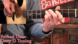 Forked Deer is a fiddle tune in D. This week at BanjoBenClark.com we're learning it in Drop D tuning on guitar, which is fun to do. Gold Pick members on the site can now receive: – 20 minute video lesson including a vid on how to play rhythm in Drop D! – Tabs in both .pdf & .tef file formats! – 3 speeds of mp3 rhythm tracks! Lesson Link: http://tinyurl.com/q3td9wu | Banjo Ben