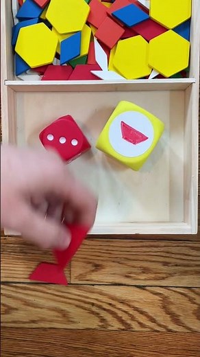 Easy kindergarten math game - tangram roll and build!