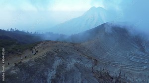 Ijen Volcano Caldera, flying along the border of Ijen Volcano in Java, view from a drone of the Ijen Volcano Caldera