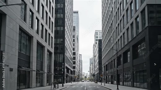 Street level bottom up view between tall buildings. Matte facades and clean urban streets
