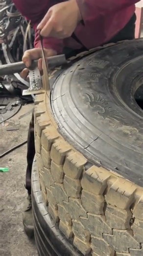 the stage of scraping rubber from a tire using a special tool is carried out by an expert#shorts