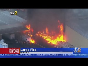 Large fire burns in Pomona warehouse