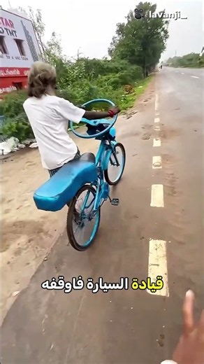 A bicycle with a real car steering wheel! 🚲🚗