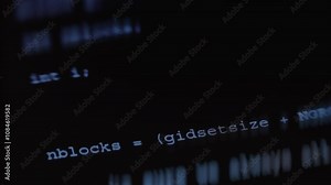 Blue hacker text code appearing on screen, macro view
