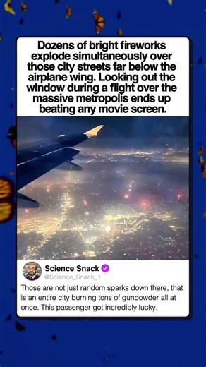 AIRPLANE WINDOW FIREWORKS VIEW