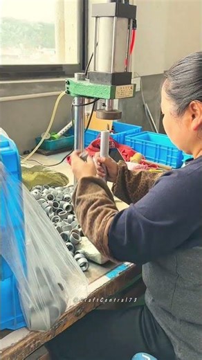 High-Efficiency Industrial Assembly: Skilled Worker Mastering the Component Press Machine