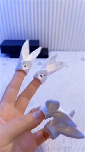 Learn how to make an adorable little bunny out of tissue paper! It's so useful for soothing your little one. Make one for your little one! #origami #howto #papercraft | People Crafts