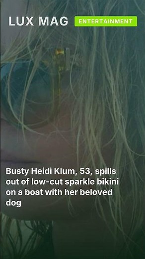 Busty Heidi Klum, 53, spills out of low-cut sparkle bikini on a boat with her beloved dog #shorts