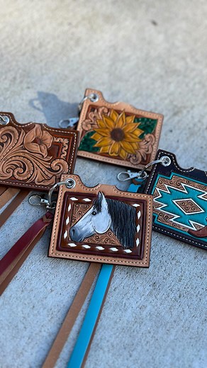 This cute little batch of keychain wallets will be added to my Etsy shop at 9:00 am CST tomorrow morning (2/20/24)! ❤️ https://braidedrootscraftco.etsy.com #keychainwallet #cardwallet #leatherwork #tooledleather #handmade #oneofakind #westernstyle #westernwallet #braidedrootscraftco | Braided Roots Craft Co