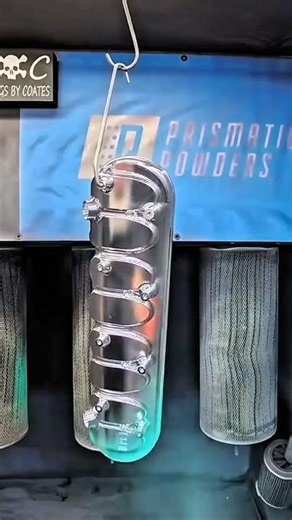 Turquoise engine part powder coating process