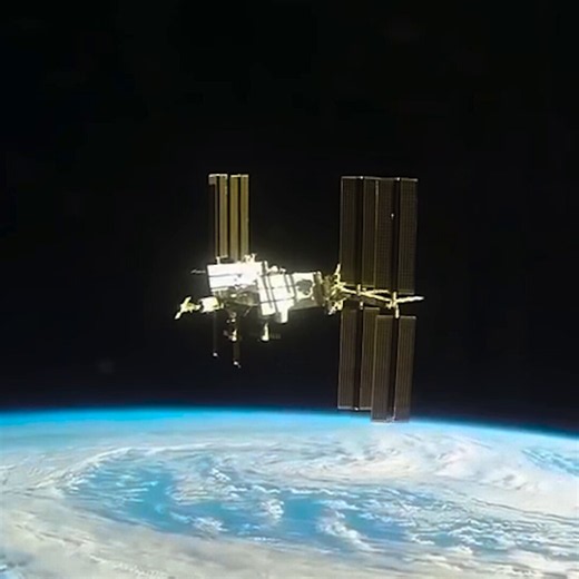 The International Space Station over the Earth as seen by an approaching spacecraft.