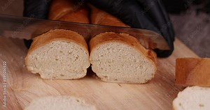 Sliced soft French bread made of wheat flour, fresh baguette cut for making snacks