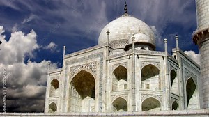 The Taj Mahal, meaning Crown of the Palace, an ivory-white marble mausoleum on the south bank of the Yamuna river in the city of Agra, India.