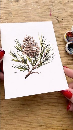 Simple glittery watercolor pinecone for day 6 of watercolor holiday card making ￼