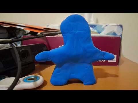 Klay Man dancing with moving objects next to him (Clay-Mation test)