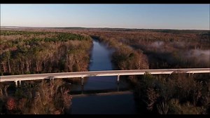 The GA 57 Oconee River bridge (📸 Larry Morris) at the Wilkinson/Washington county line was rebuilt a decade ago. But this Ball’s Ferry location has an extensive history... Located at an old river crossing of the Upper Uchee Indian trail, Ball's Ferry was established in 1806 by John Ball, a Revolutionary War veteran, to provide transport access to the river. Wilkinson County's economic mainstay was cotton and food crops and their shipment to market was vital. Ball's Ferry served as one of the im