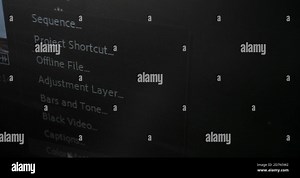 White cursor moves along computer program menu to choose Sequence for creating video and stops extreme close view Stock Photo - Alamy