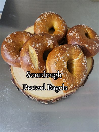Sourdough Pretzel Bagels. For anyone wondering how I got that deep pretzel color and flavor: traditionally, pretzels are dipped in a lye bath. Lye is the gold standard for that classic chewy crust and rich brown shine, but it can be tricky to source and handle safely at home. So here’s the “home baker–friendly” workaround I used instead: baked baking soda. What I did: Spread regular baking soda in an even layer on a parchment‑lined sheet pan Baked it low and slow for about an hour, let it cool, 