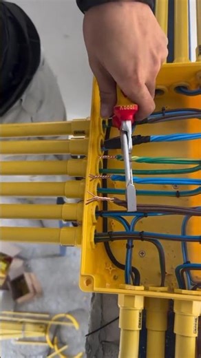 Using two pairs of pliers to tighten the circuit joint. #diy #circuit #simplyconnect