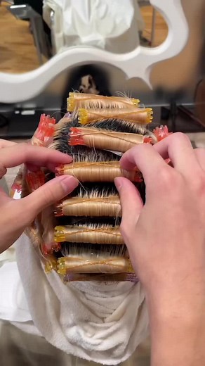 Applying Colorful Hair Extensions in a Salon