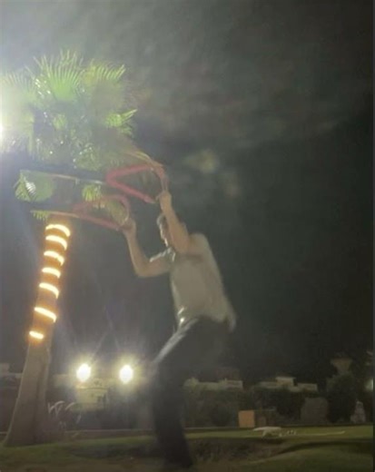 Man Falls Backward Playing Rings Game