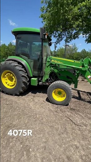 John Deere 4075R with Box Blade on the back and Heavy Hitch Land leveler on the loader .