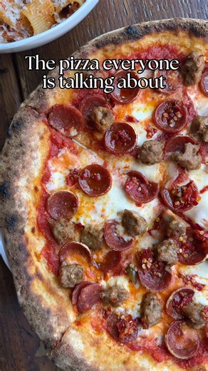 This isn’t just pizza… this is pizza the Dark Horse way 🍕🐎 Everything’s made from scratch because we know it matters. Our natural levain sourdough crust is topped with only the freshest ingredients, then fired to melty perfection in the pizza oven 🔥. One standout? The Paisano—tomato, pepperoni, house sausage, mozzarella, and Calabrian peppers. Share it… or don’t. Your call 😏. Send this to the friend who still owes you a slice 👀 | Dark Horse Bar&Eatery