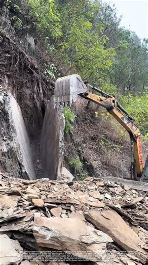 The excavator is digging slate