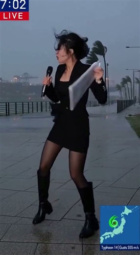Reporting LIVE in a Storm! 🌪️💨 She’s Fighting the Wind Like a Hero #StormReporter #LiveNews