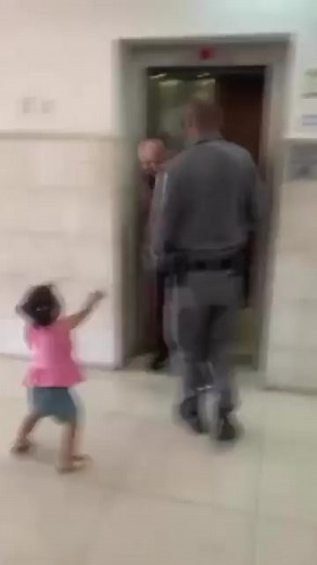 #Heartbreaking footage shows Israeli forces preventing Palestinian father Ramzi Abbasi from hugging his daughter, yet the father still keeps a smile on his face to comfort the little girl. | Olive Palestine