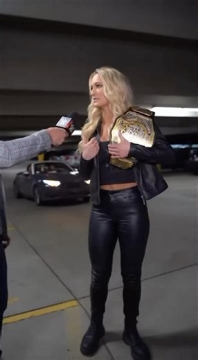 "Parking Garage Showdown: Blonde Pro Wrestler Battles Opponents in High-Speed Chase for the Belt!"