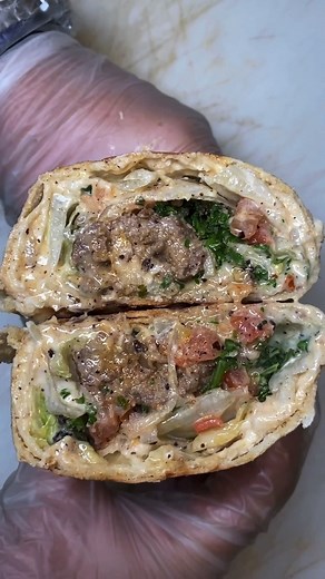 Yanni 🍴 Foody Fetish on Instagram: "Kafta (Lebanese Kebab) Wrap!🇱🇧🥙 Pita Bread stuffed with Kafta Beef, hummus, lettuce, onions, tomatoes, fresh parsley, and tahini then toasted! 📍: @shawarma.al.basha 🌇: Miami, FL 🎥: @foodyfetish #foodyfetishoriginal Tag a Hungry Friend!👇🏼"