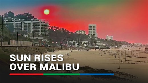 A smoky sunrise over Malibu cast pinkish hue over the iconic beaches of the California city. A thick cloud of wildfire smoke hung over the Los Angeles area creating fiery and otherworldy sunrises from different vantage points. See comments section for the related story. | ABS-CBN News