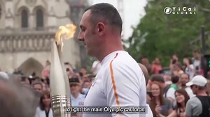 The #Olympics flame debuted at France's National Day parade on July 14, 12 days before Paris hosts the Summer Olympics Games 2024. The torch relay will travel 60 kilometers, passing by famous landmarks including Notre Dame Cathedral and the Louvre Museum. | Yicai 第一财经 | Facebook